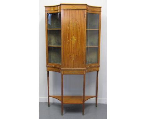 EARLY 20TH CENTURY INLAID SATINWOOD BREAK FRONTED DISPLAY CABINET overall with chequered and foliate inlaid decoration, centr