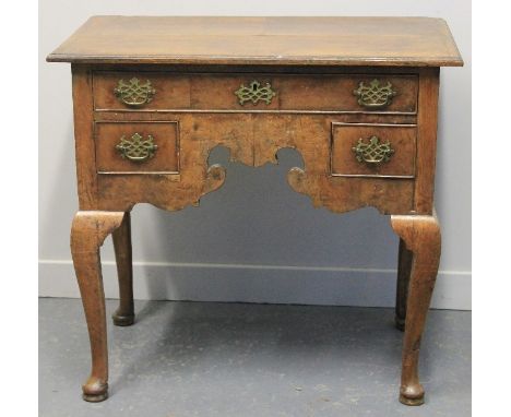 18TH CENTURY WALNUT LOWBOY, the moulded edge top with quartered veneers within cross banded border over long cock beaded frie