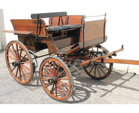 19TH CENTURY FOUR WHEELED, SINGLE SHAFT, DOG CART, its hubs marked: P.W. Graham of Lampeter, overall varnished oak constructi