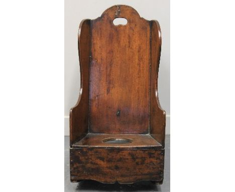 EARLY 19TH CENTURY WELSH OAK ROCKING CHILD'S WING COMMODE CHAIR.  64cm high. CONDITION REPORT: Appearing in good original con
