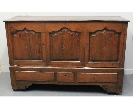 EARLY 19TH CENTURY WELSH OAK COFFER, now with fixed top over flip front, having three ogee pointed arch panels with inlaid st