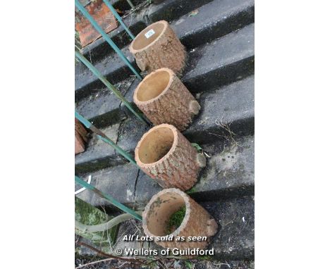 *FOUR CLAY TREE TRUNK FORM PLANTERS