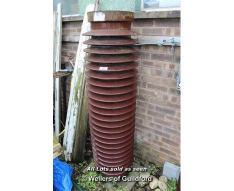 *CERAMIC ELECTRICITY INSULATOR, SET UP AS A WATER FEATURE. LATE 1900S