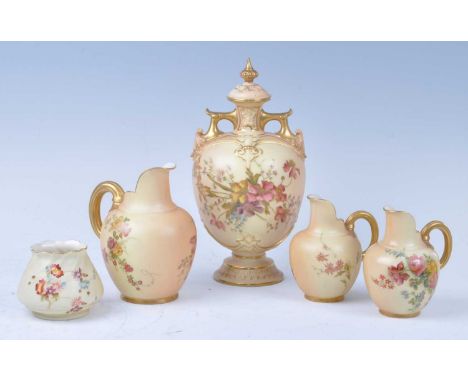 A collection of Royal Worcester blush ivory porcelain, to include a circa 1897 urn, decorated with flowers, shape 1654, h.23c