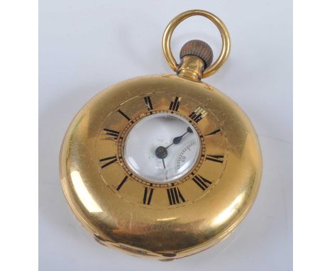 An early 20th century Swiss gent's 18ct gold cased half hunter pocket watch, having a white enamel Roman dial (badly damaged)