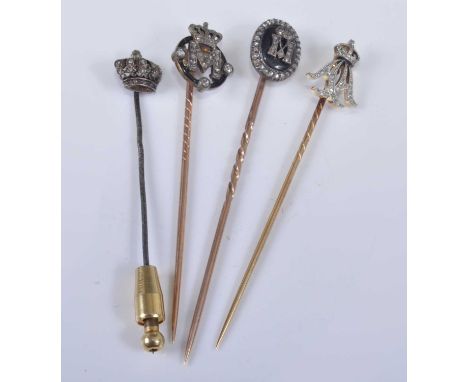 Four yellow and white metal diamond set royal monogram stick pins, one designed as an initial M surmounted by a crown within 