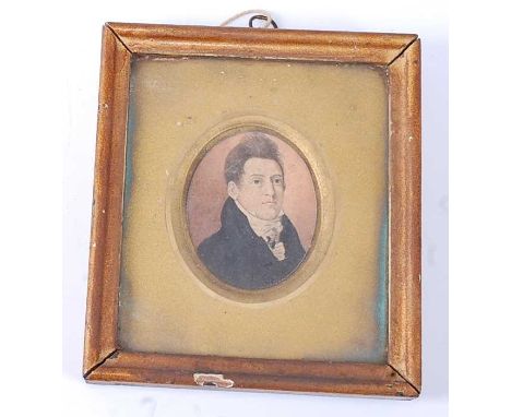 Early 19th century English school - Young gentleman wearing a high-collared black jacket and white cravat, miniature watercol