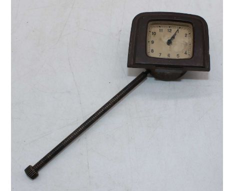 A bakelite fronted pre-war automobile clock, w.7.5cm 