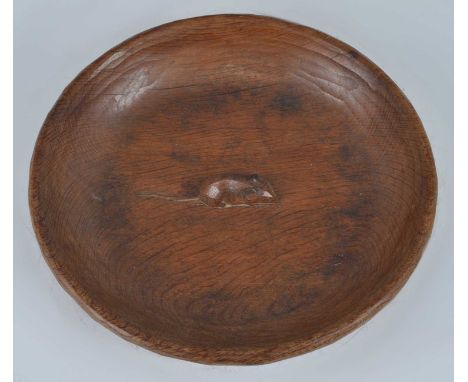 Robert 'Mouseman' Thompson - a carved oak circular table bowl, of shallow form, with typical adzed surface and central signat