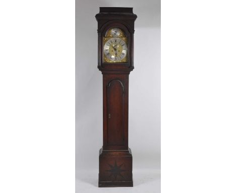 Richard Rayment of Bury (St Edmunds) (c1686-1754) - a mid 18th century oak longcase clock, having a 12" arched brass dial, ca