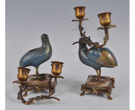 A pair of Chinese cloisonne enamel quail candelabra, each bird decorated in coloured enamels on a turquoise ground, with atta