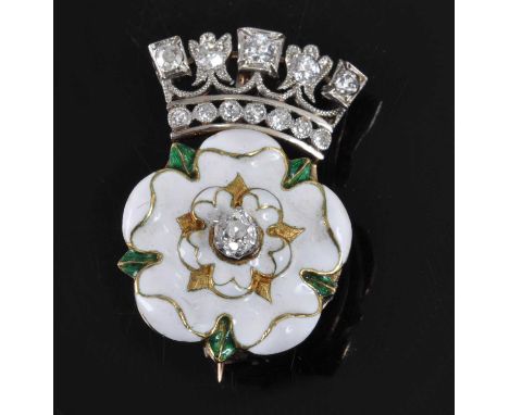A yellow metal, diamond and enamel brooch commemorating George VI as Duke of York, featuring a white enamel rose with centre 