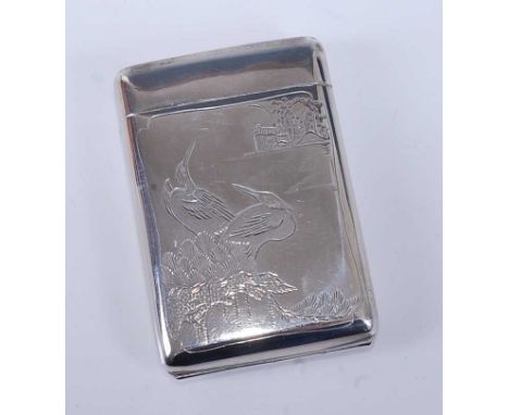 An early 20th century Chinese silver cigarette case, of hinged rectangular form with strike to the hinged cover, one side dec