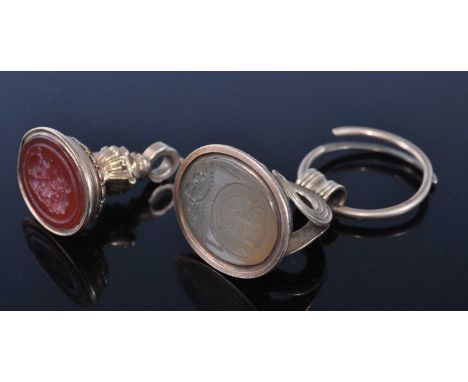 An early 19th century yellow metal fob seal, the carnelian intaglio carved with a profile portrait, unmarked but tests as app