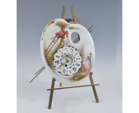 A late 19th century French easel clock, the ceramic dial in the form of an artists palette decorated with quarter fruit-picke