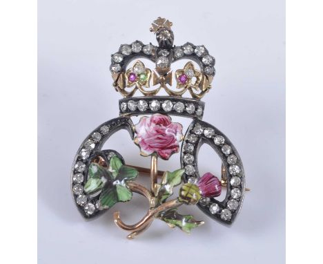 A late Victorian yellow and white metal, enamel and diamond brooch commemorating the 1897 Diamond Jubilee of Queen Victoria, 