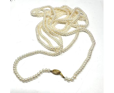 9ct gold clasp cultured button pearl opera length single strand necklace (92g)