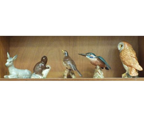 A Beswick model of a Thrush 2308, Beaver 2195, Kingfisher 2371, Barn Owl 1046 and a Nao model of a donkey, (a/f, chip to ear)