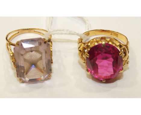 A Chinese gold ring set large red synthetic stone, size M½ and another ring set pink paste, size K½, 11.6g, (2).