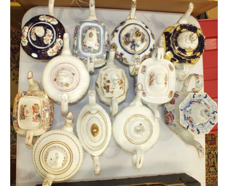 A collection of twelve 19th century and later ceramic teapots.