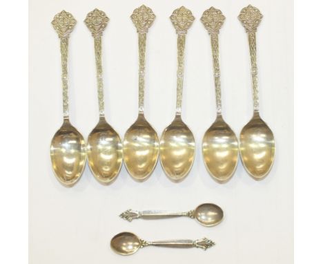 A pair of Georg Jensen silver salt spoons and a set of six silver teaspoons with Celtic decoration, Sheffield 1964, ___3oz.