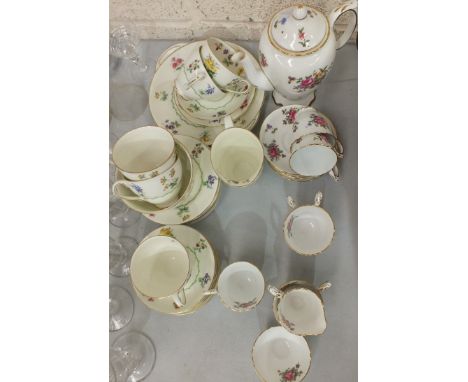 A Royal Doulton foliate-decorated bone china tea part-service, 20 pieces a Crown Staffordshire bone china tea part-service de