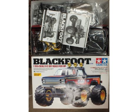 A Tamiya Blackfoot 1/10th scale R/C off-road pick-up, boxed, (unused).