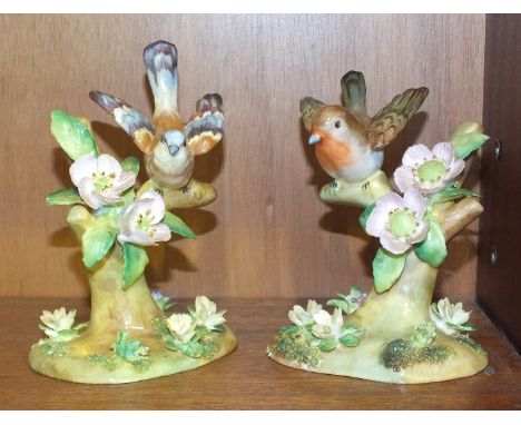 A Crown Staffordshire ceramic Chaffinch with wings outstretched, on branch, 13cm high and another similar model of a Robin on