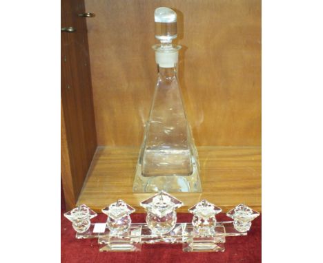 A Swarovski cut-crystal five-light pricket candelabrum, 32cm long, (small chip) and a modern pyramid-shaped glass decanter wi