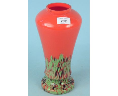 An early 20th Century green and red glass art vase