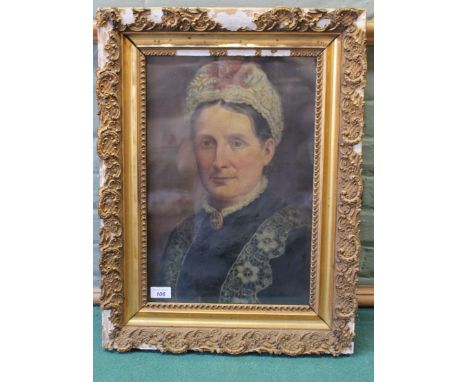 A 19th Century oil on canvas portrait of a woman wearing a brooch, 46cm x 33cm