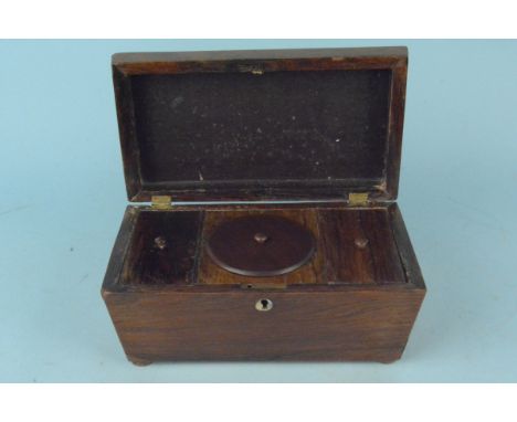 A mid 19th Century rosewood sarcophagus shaped tea caddy