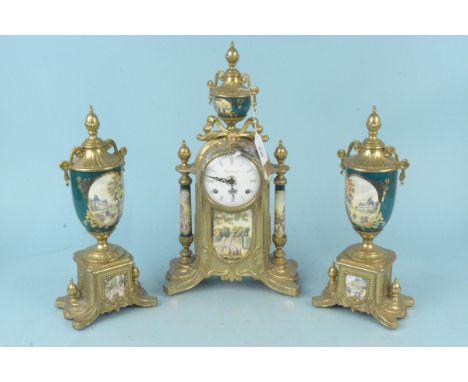 An ornate Italian ''Imperial" clock garniture, brass with ceramic decoration, key wind mechanism, the central clock 42cm tall