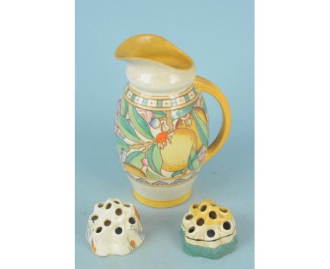 A Clarice Cliff Crocus pattern flower frog holder, marked Bizarre Crocus to base, a Fantasque pattern example and a Burleigh 
