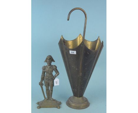 A solid brass antique Nelson figure doorstop, 33cm tall plus a brass umbrella shape stick and brolly stand