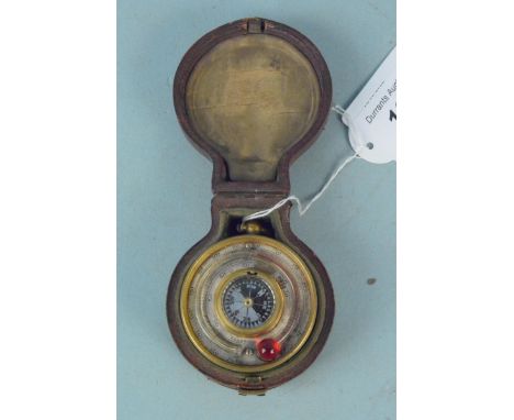 A double sided early 20th Century barometer and thermometer compass in twin lidded leather case