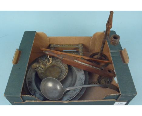 A mixed lot of items including three antique pewter dishes, Victorian brass letter box, pewter, ladle, iron rush light/candle