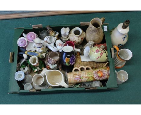 A mixed box of ceramics including figurines, jugs, lamp base etc