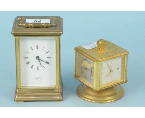 A brass carriage clock retailed by St James, London together with a rotating desk clock featuring thermometer, barometer etc