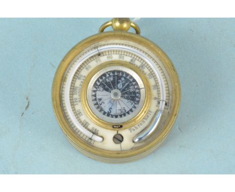 An early 20th Century double sided thermometer and compass and barometer