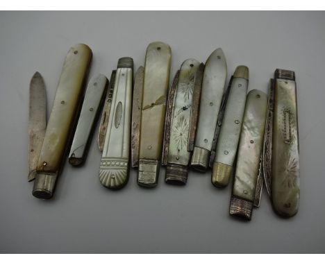 8 silver bladed fruit knives (plus one other) all with mother of pearl handles