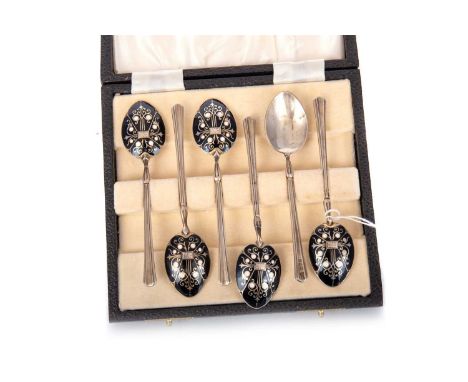 SET OF SIX GEORGE VI SILVER AND ENAMEL COFFEE SPOONS, T & S BIRMINGHAM, 1938 the bowl backs with white enamel and scroll deta
