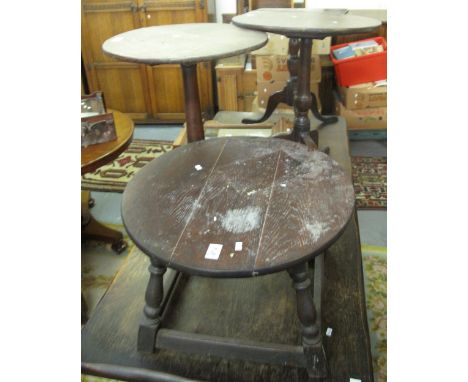 Three 19th Century tripod tip-top tables, together with a mid 20th Century low oak circular side table. (4)(B.P. 24% incl. VA
