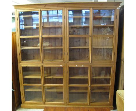 Vintage pine two stage display unit with adjustable shelves. (B.P. 24% incl. VAT) CONDITION REPORT: Two sections.Measurements