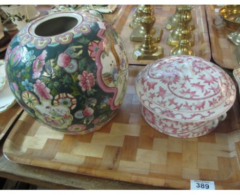 20th century polychrome ginger jar, decorated with panels of a mandarin with boys in a garden surrounded by fruits and flower