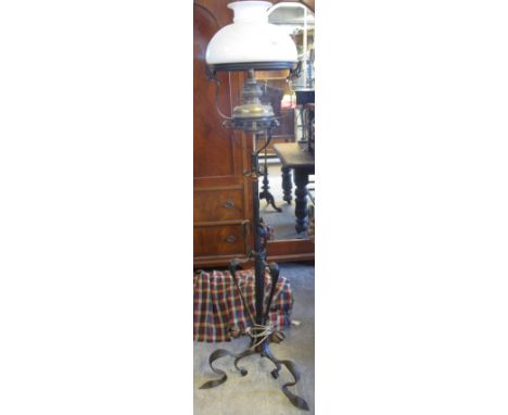 Art nouveau design cast metal standard lamp with glass opaline shade, converted from an oil burner. (B.P. 24% incl. VAT) COND