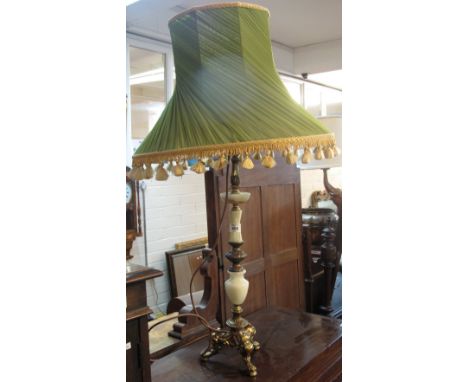 Gilt metal and onyx table lamp with shade.(B.P. 24% incl. VAT)