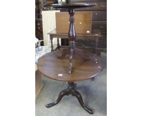 19th Century mahogany circular tilt-top tripod table, together with a smaller 19th Century mahogany oval tilt-top tripod tabl