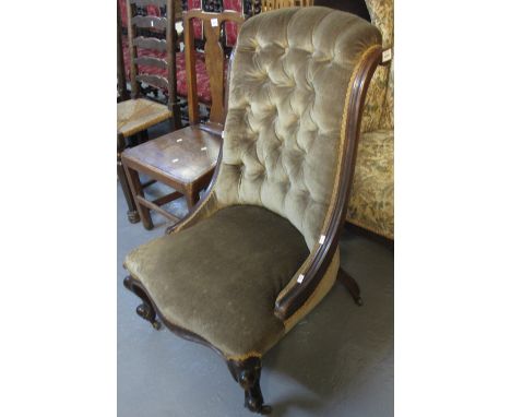 Victorian mahogany upholstered button back fireside or bedroom chair on cabriole legs and casters. (B.P. 24% incl. VAT)