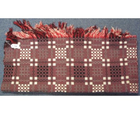 A red and green ground double sided vintage Welsh tapestry blanket with fringed edging, double size. (B.P. 24% incl. VAT)